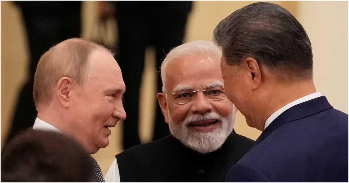 চীনে এসসিও শীর্ষ সম্মেলনে রাশিয়ার প্রেসিডেন্ট ভ্লাদিমির পুতিন, ভারতের প্রধানমন্ত্রী নরেন্দ্র মোদি ও চীনের প্রেসিডেন্ট শি চিনপিং। ছবি: রয়টার্স